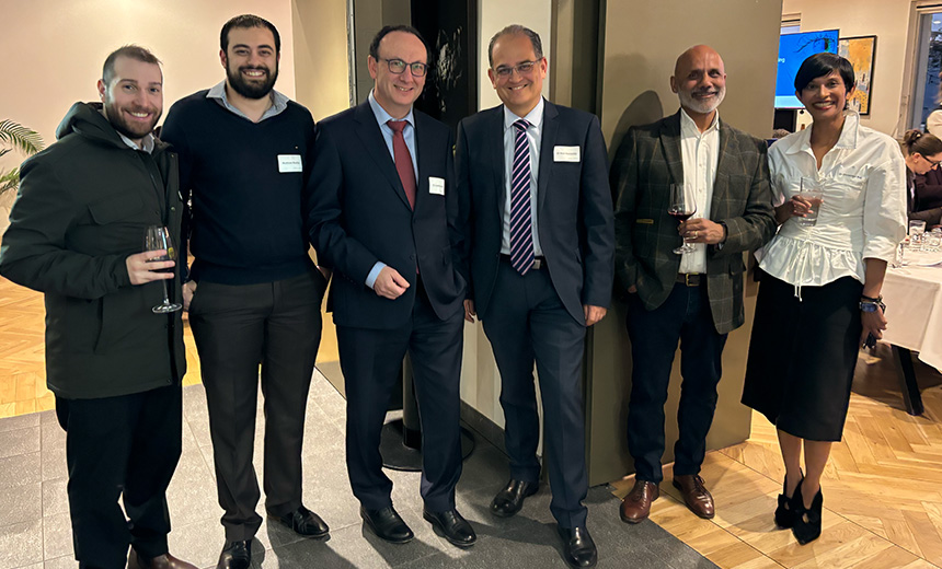 A photo of Dr Lewis Levitz, Dr Alex Ioannidis, Dr Devinder Chauhan, Dr Christolyn Raj and two practice managers standing together and smiling.