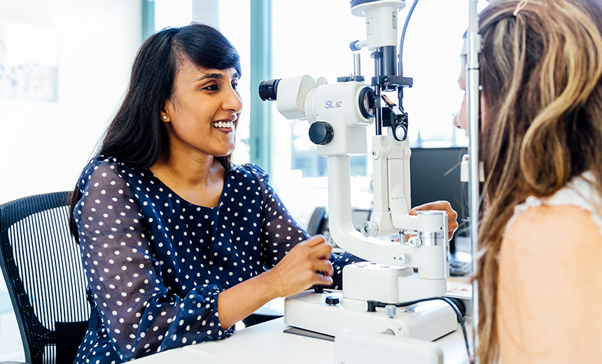 Dr Rushmia Karim examining a patient.