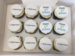 Box of celebratory cupcakes for Windsor Gardens Day Surgery first birthday