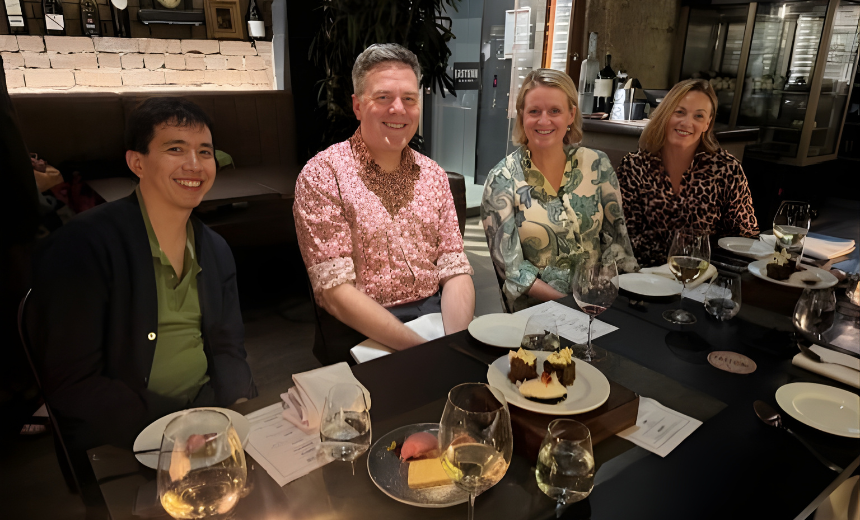 Vision Eye Institute's Dr Chris Go, Chris Hodge, Amanda Cranage and Siobhan Todhunter are seated at a table while dining out together. 