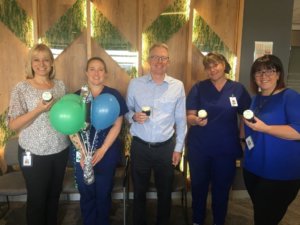 Annette Nelson, Dr Marc Le Mire and Windsor Gardens Day Surgery staff celebrating the facility's first birthday